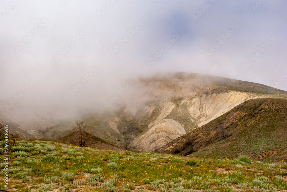 Crimea. Early spring. The mountains. Low cloud cover. Fog.