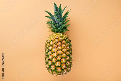 Tasty pineapple on colored background, flat lay. Pineapple on a colored background