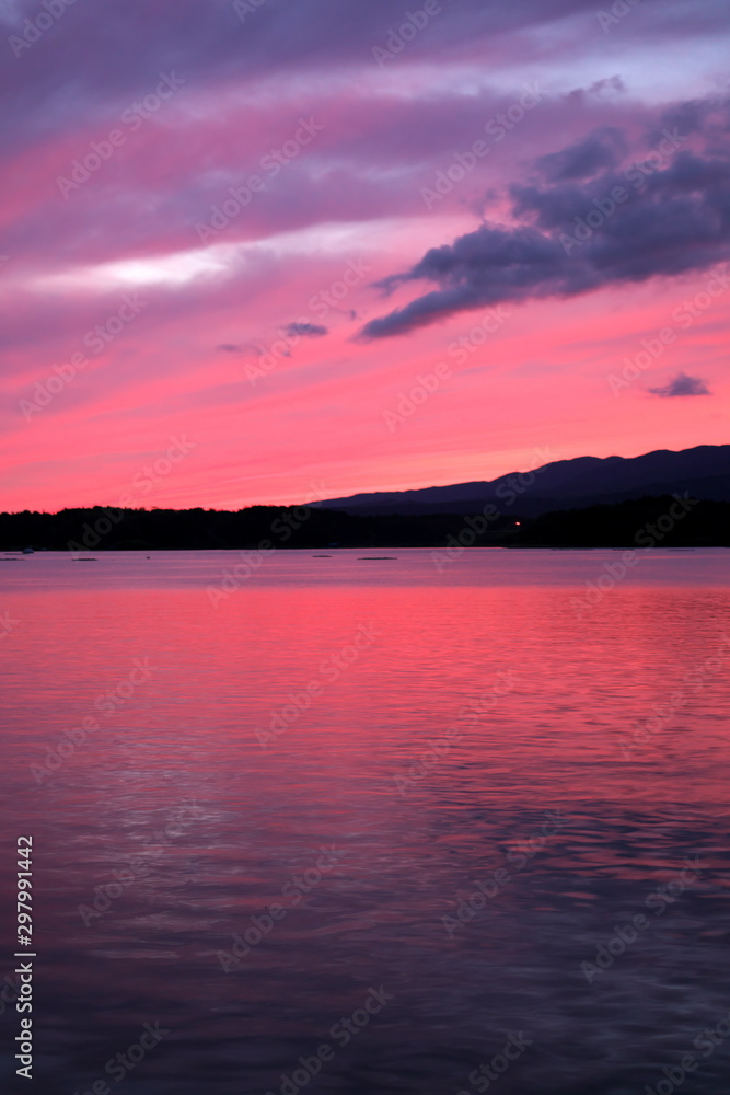 Niigata,Japan-October 20, 2019: Beautiful sunset observed at Lake Kamo, Sado island, in autumn Niigata,Japan-October 20, 2019: Beautiful sunset observed at Lake Kamo, Sado island, in autumn