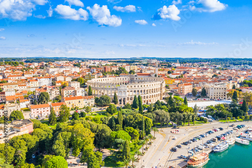 Croatia, city of Pula, ancient Roman arena, historic amphitheater and old town center fron drone, aerial view