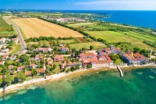 Dajla. Aerial view of coastal village of Dajla and abandoned convent photo