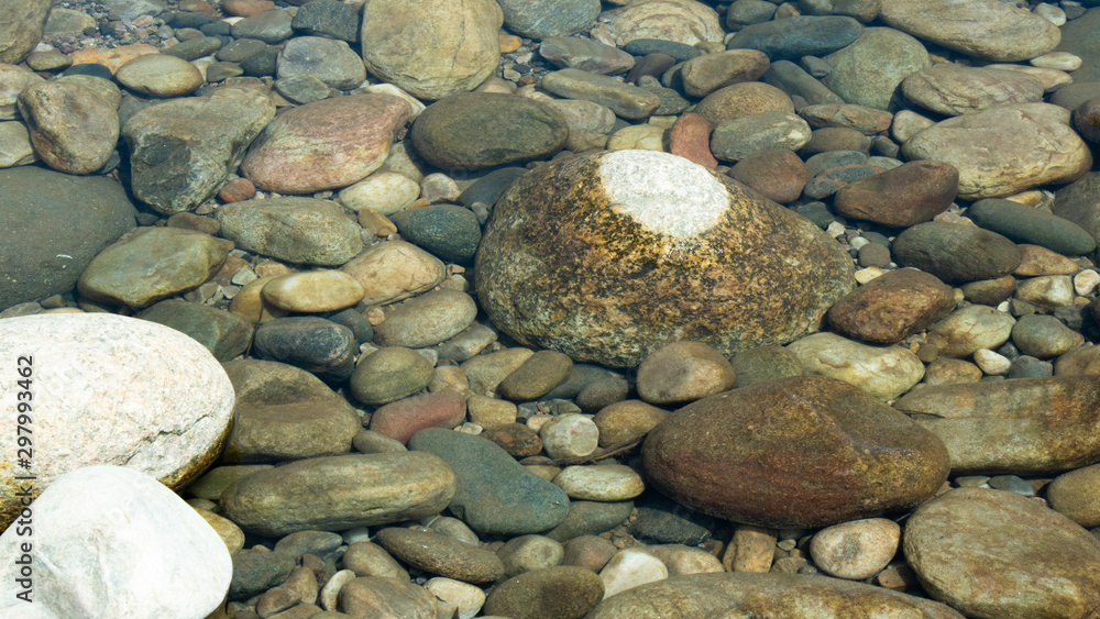 Under water Stone on the lake after waterfall