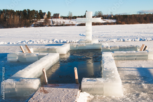 Fototapet winter baptismal font on lake