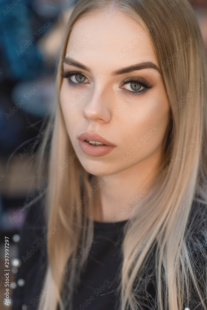 Portrait of a beautiful young girl with make-up, model appearance, close-up. Portrait of a beautiful young girl with make-up, model appearance, close-up.
