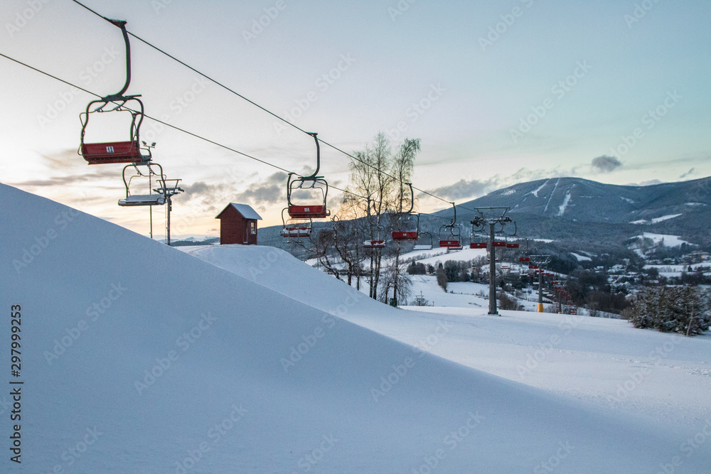Obraz premium Sunset with ski chair lift, krkonoše, mountains