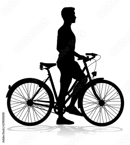 Fototapeta Naklejka Na Ścianę i Meble -  A bicycle riding bike cyclist in silhouette