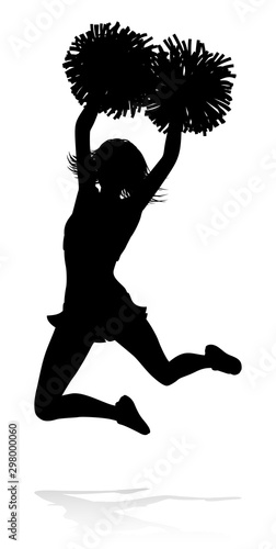 Sports cheerleader in silhouette with pompoms photo