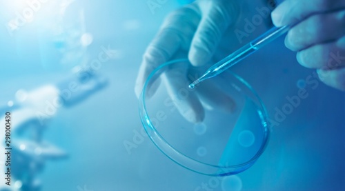 Cuadro en lienzo Science and medicine, scientist analyzing and experiments contai