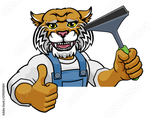 A wildcat cartoon mascot car or window cleaner holding a squeegee tool peeking round a sign and giving a thumbs up