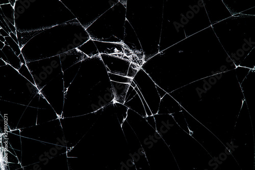 cracked glass isolated on a black background.
