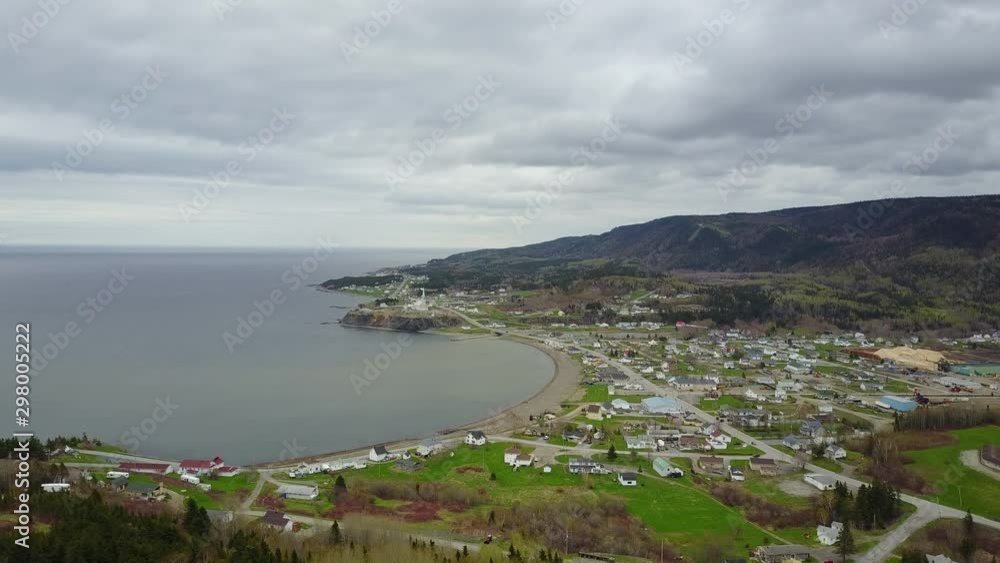 Gaspésie peninsula coast aerial view on a cloudy day. Quebec, Canada drone flight. Gaspésie peninsula coast aerial view on a cloudy day. Quebec, Canada drone flight.