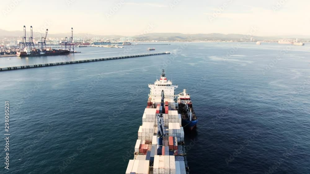 i Container ship at anchorage during bunkering at Algeciras anchorage ...