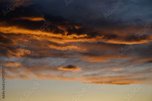 Dramatic sky with orange clouds. Nature background. © Vladimir Arndt