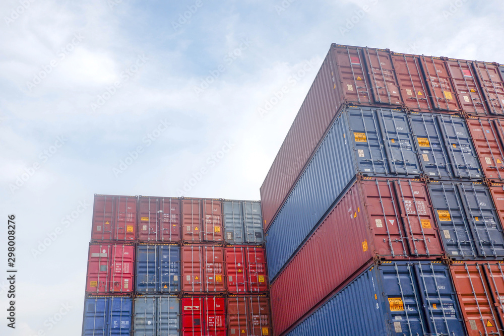Fototapeta premium Container stacks in vessels waiting to be imported and exported