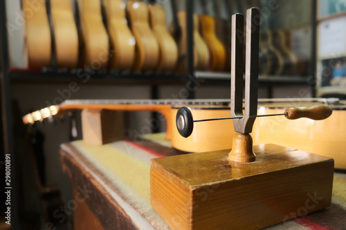 Diapason On Counter Desk Of Classic Guitars Shop photo