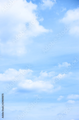 Pastel blue sky with light clouds #298011875