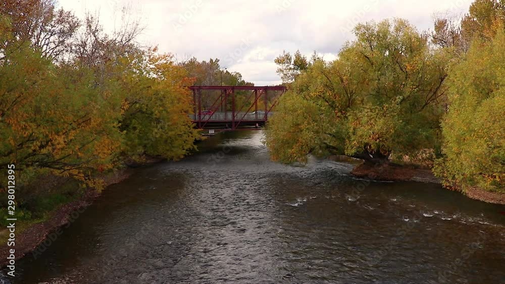 Boise Idaho River Flowing Through Trees Under A Bridge 15 Second Slow Motion Video. Boise Idaho River Flowing Through Trees Under A Bridge 15 Second Slow Motion Video.