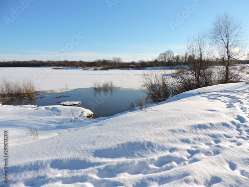 winter landscape with lake and trees