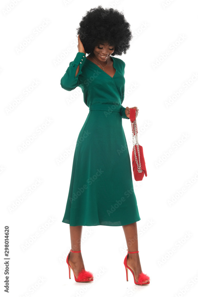 Perfect, total look of happy african woman in green dress and red accessories. Perfect, total look of happy african woman in green dress and red accessories.