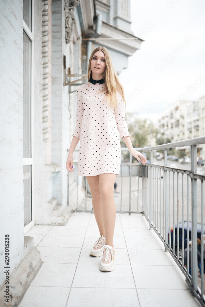 young woman in blue dress young woman in blue dress