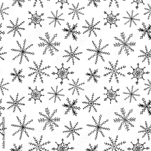 Seamless pattern with snowflakes. New year and Christmas backgrounds and texture. Black and white. Hand drawn. Seamless pattern for greeting cards  paper  fabric  textile  prints  backgrounds