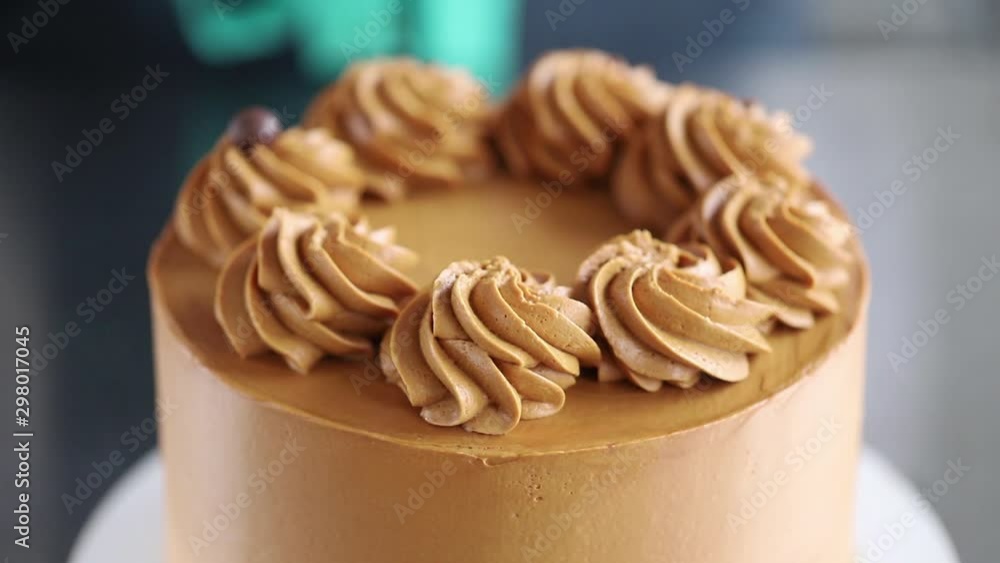 cake decorating, chocolate dragees and chocolate cream cake decorating, chocolate dragees and chocolate cream