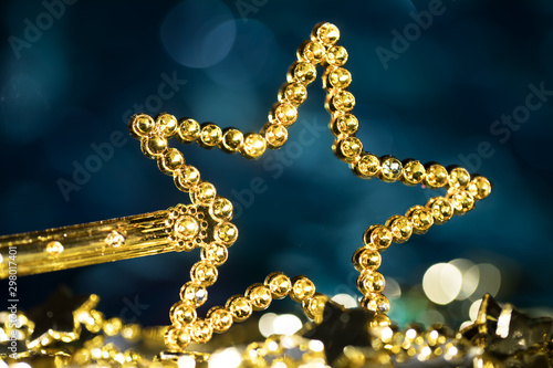 Golden star with bokeh background, festive banner