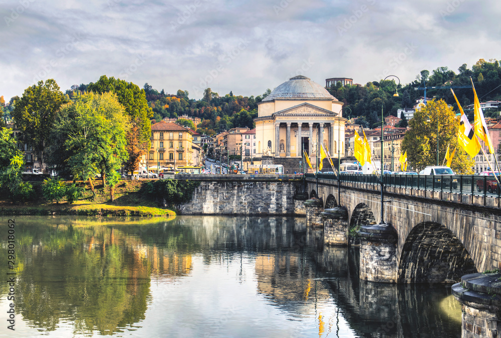 Ancient Bridge in Turin and the River Po