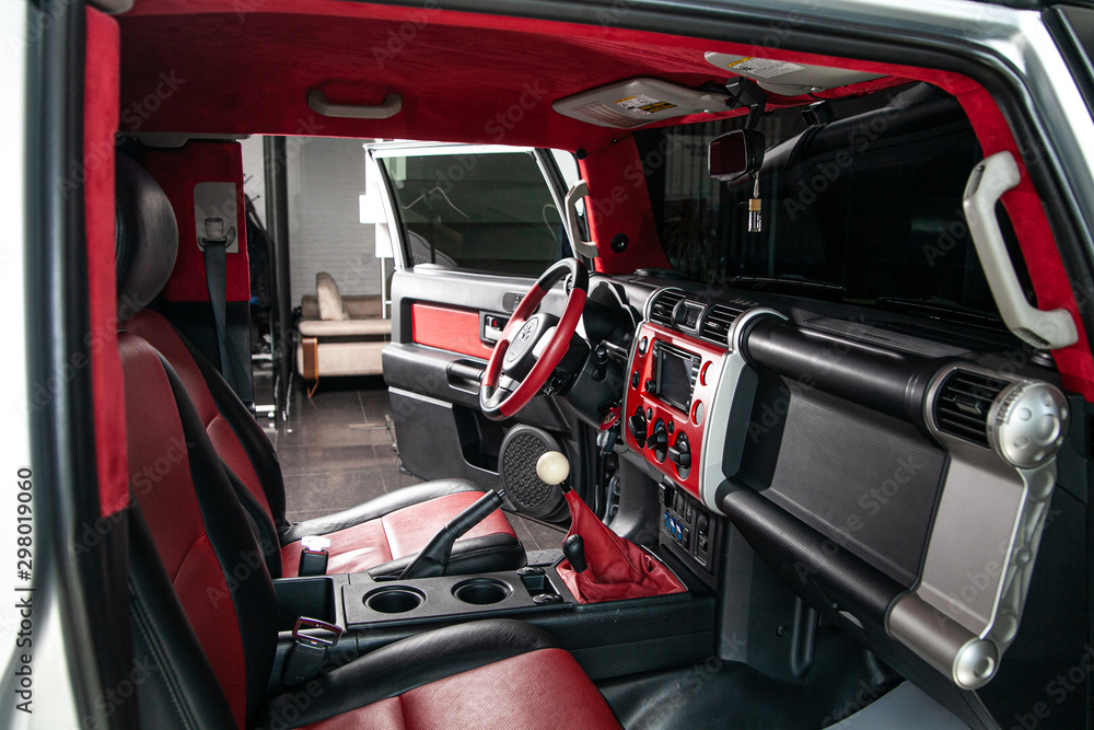 red car in garage