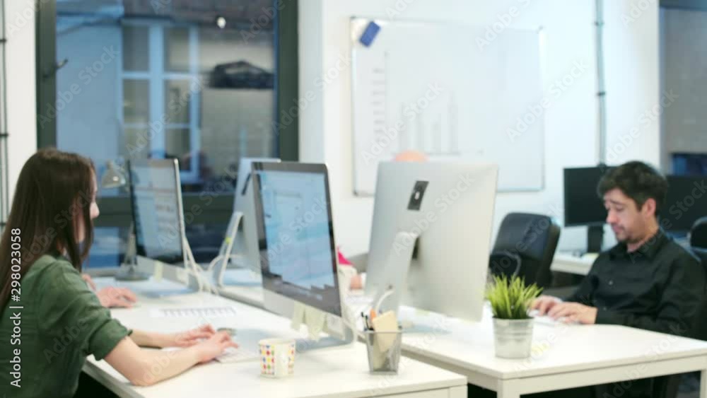 People working in modern open plan office People working in modern open plan office