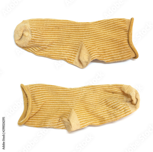 Old dirty socks on white background