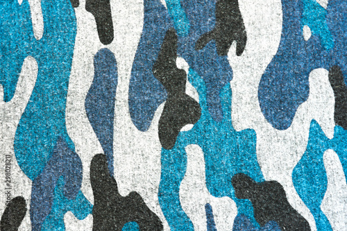 BLUE BLACK CAMOUFLAGE FABRIC TEXTURE BACKGROUND. military and hunting clothes