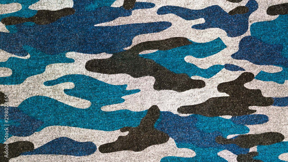 BLUE BLACK CAMOUFLAGE FABRIC TEXTURE BACKGROUND. military and hunting clothes BLUE BLACK CAMOUFLAGE FABRIC TEXTURE BACKGROUND. military and hunting clothes
