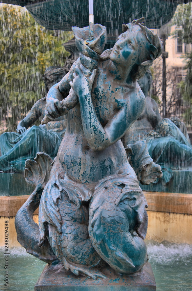 Baroque Fountain in Dom Pedro IV square in Lisbon, Portugal