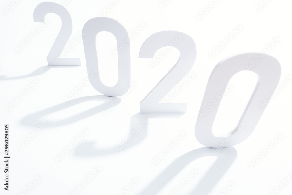 paper 2020 numbers with shadow on white background paper 2020 numbers with shadow on white background