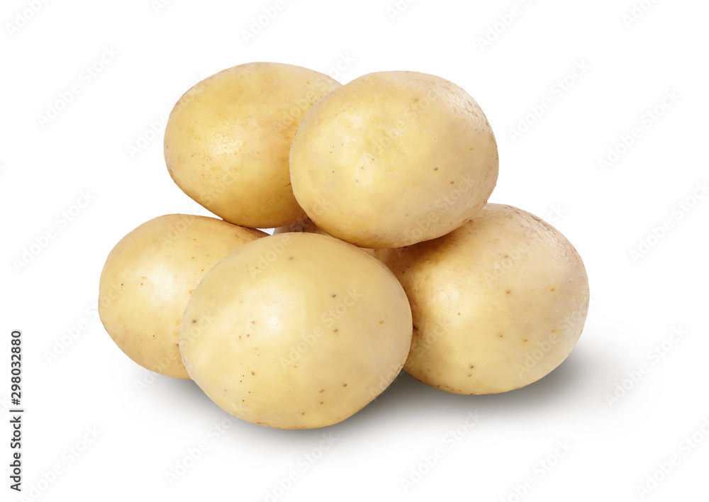 A pile of fresh potatoes isolated on white background A pile of fresh potatoes isolated on white background