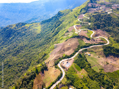 Top view Aerial photo from flying drone over Mountains and winding mountain paths exciting steep at Phu Thap Boek ,Phetchabun Province,Thailand,ASIA. photo