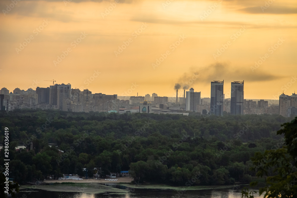 Tour of Kiev in the center of Europe. View of the Dnieper, Trukhanov island and a foot bridge. Park fountain and sunset on the horizon.. Tour of Kiev in the center of Europe. View of the Dnieper, Trukhanov island and a foot bridge. Park fountain and sunset on the horizon..