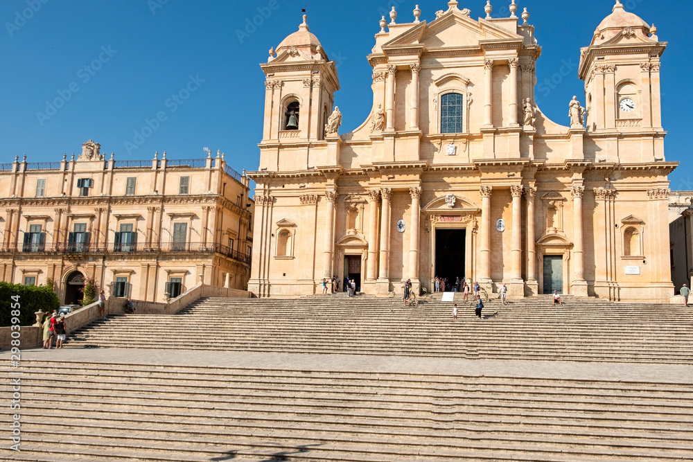 View of the San Nicolò church facade, in the city of Noto (Southern Italy, island of Sicily). Built in the typical Sicilian baroque style, it is an UNESCO World Heritage site, is also famous for its s