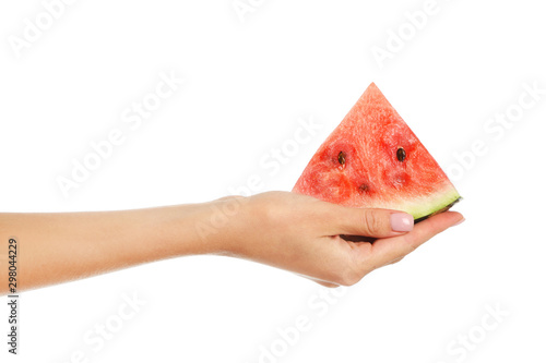 Female hand with piece of juicy watermelon on white background