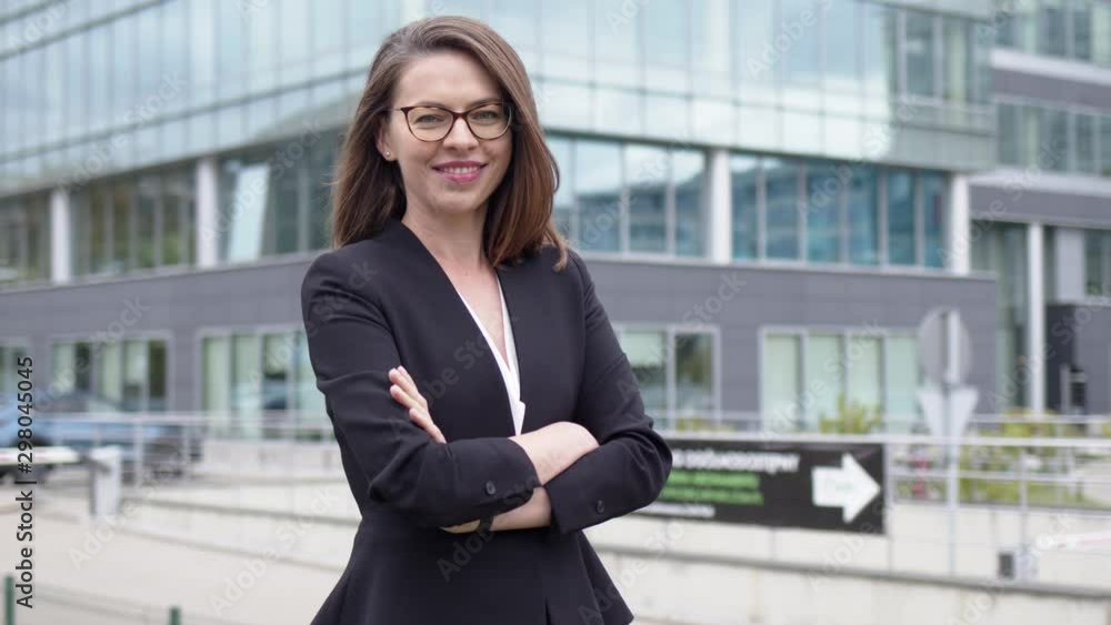 Portrait of a beautiful confident female executive, looking into the camera. Portrait of a beautiful confident female executive, looking into the camera.