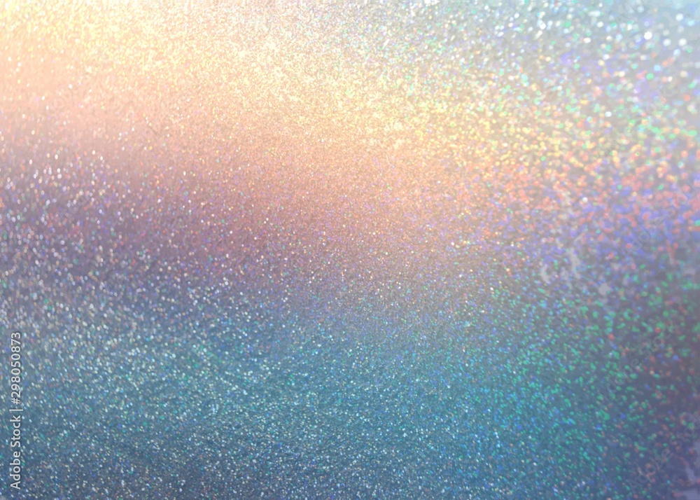 Shimmer on yellow pink blue gradient cool background. Glitter pattern. Sparkles texture.