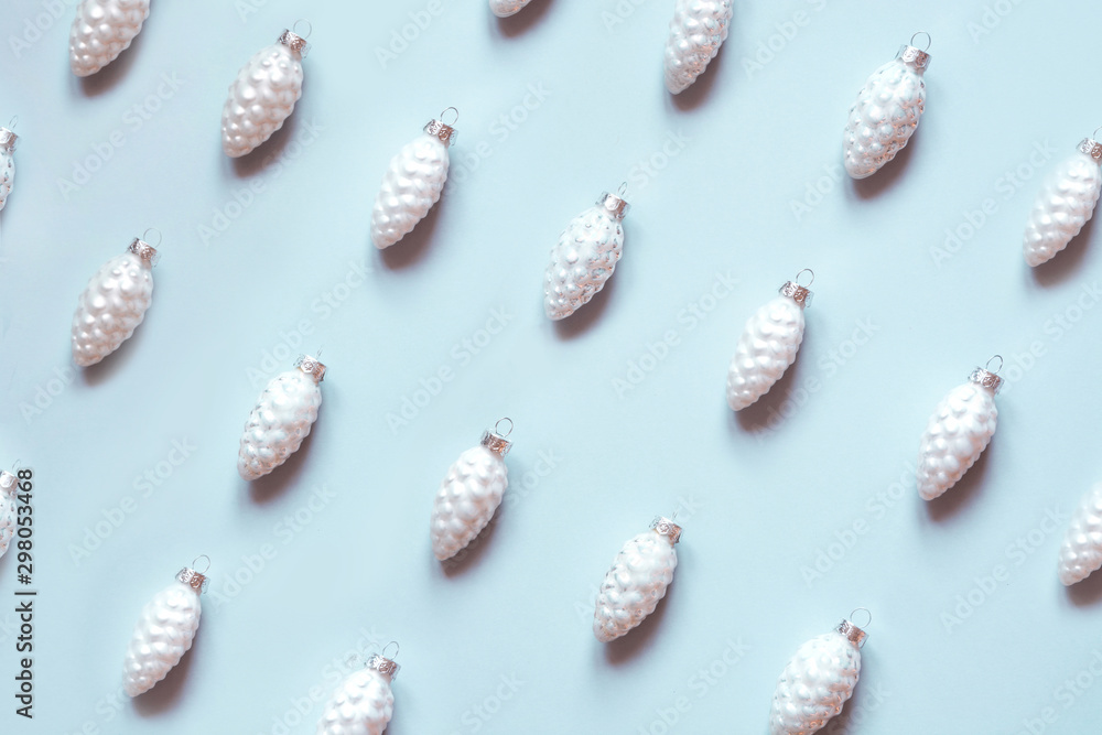 Christmas white cone and herringbone-tree decoration on pastel blue. Christmas white cone and herringbone-tree decoration on pastel blue.