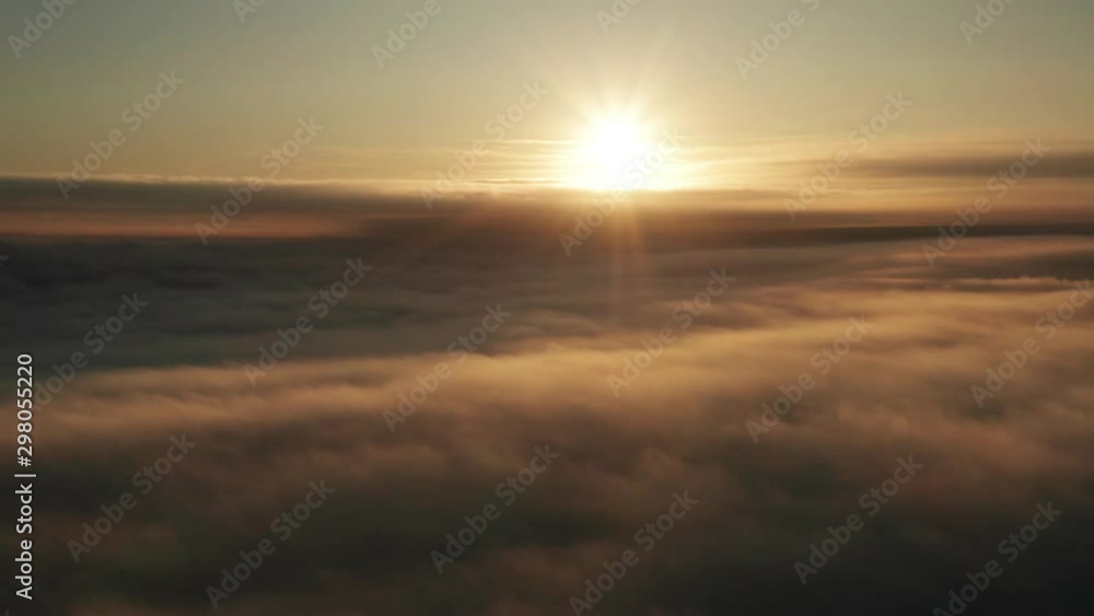 Timelapse sunset view over clouds background with bright sunshine Timelapse sunset view over clouds background with bright sunshine