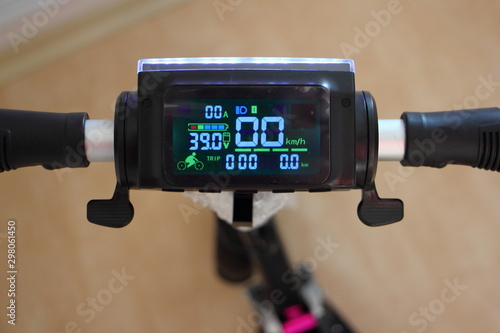 Digital LED dashboard control panel of electrical kick scooter close up
