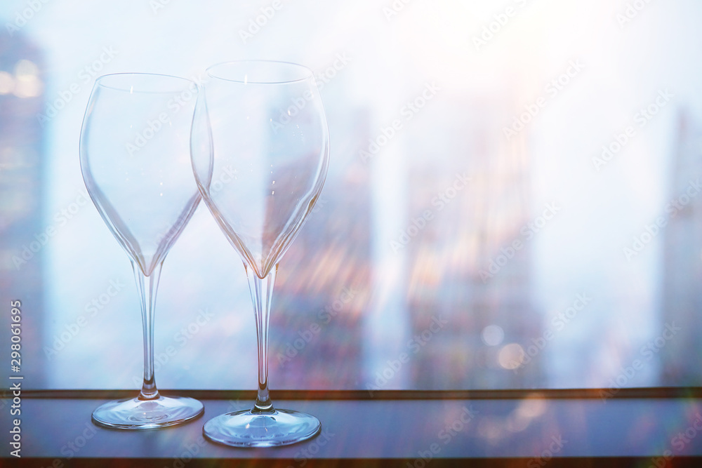Cocktail glasses on the windowsill by the glass Cocktail glasses on the windowsill by the glass