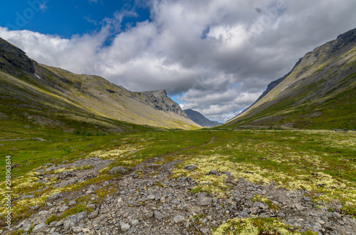 Mountain tundra with mosses and rocks covered with lichens, Hibiny mountains above the Arctic circle, Kola peninsula, Murmansk region, Russia photo