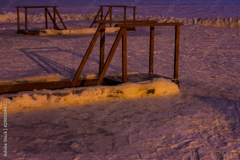 prepared hole for swimming on the feast of the baptism of Jesus Christ frosty night prepared hole for swimming on the feast of the baptism of Jesus Christ frosty night