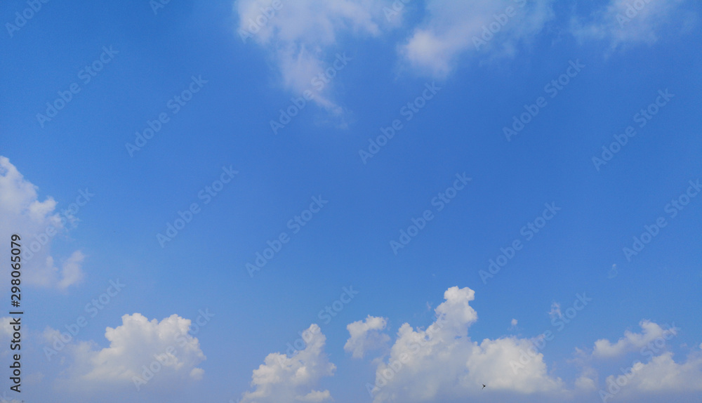 white clouds in the blue sky natural background beautiful nature space for write