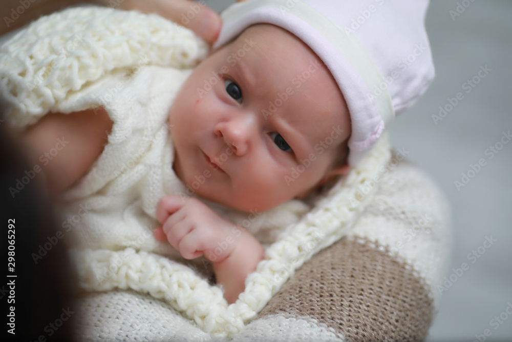 Baby newborn sleeping wrapped up in a blanket Baby newborn sleeping wrapped up in a blanket